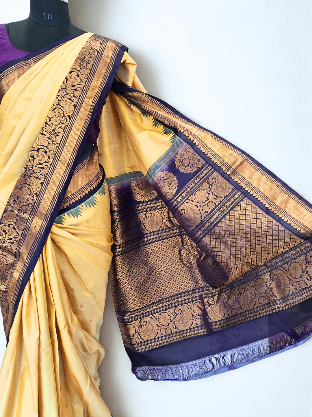 Cream Gadwal Silk Saree with Traditional Temple Border