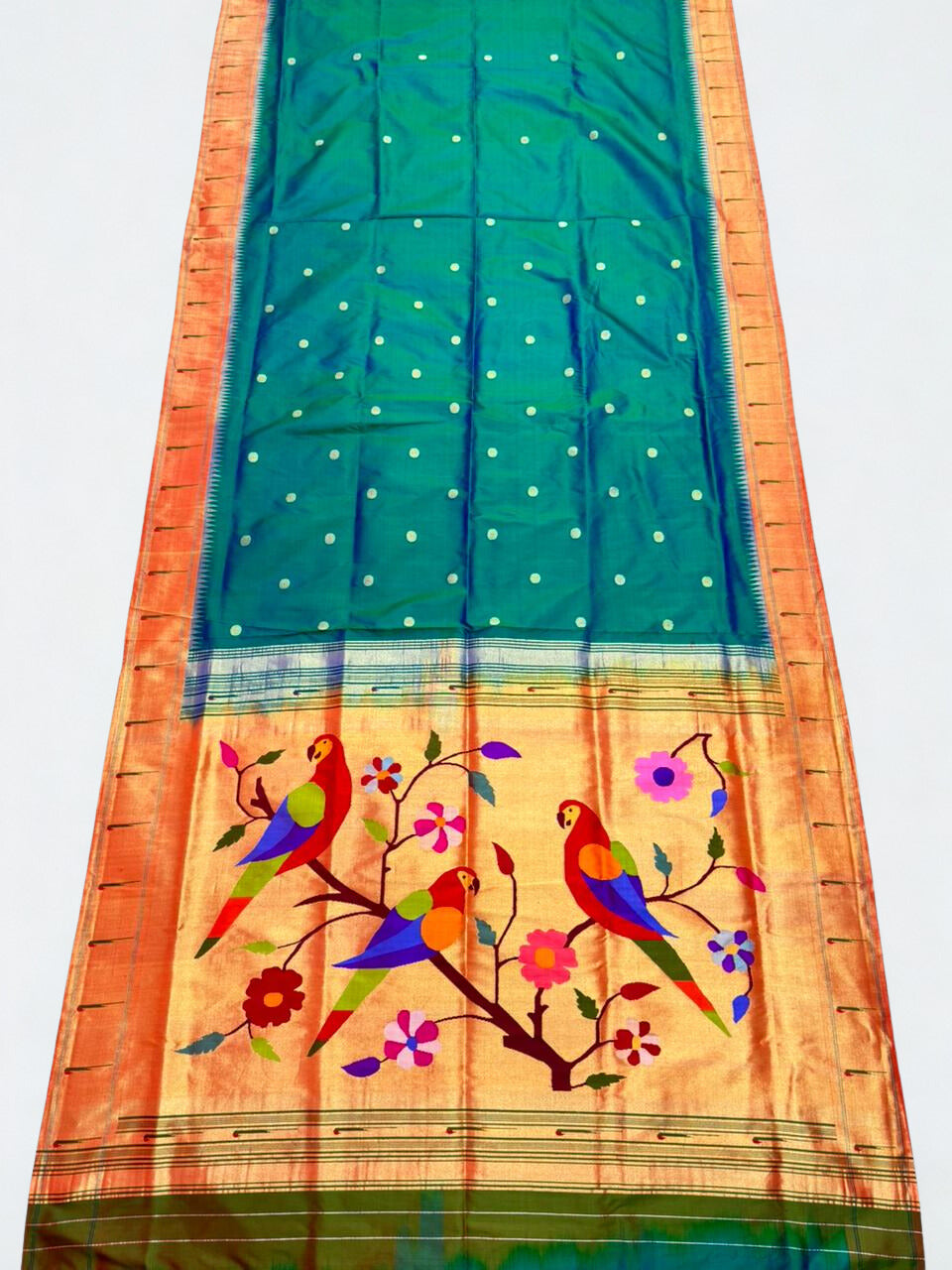 Peacock blue muniya border silk paithani saree with rich pallu