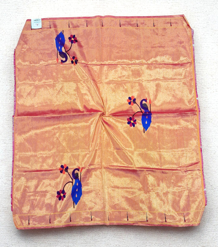 Golden tissue silk blouse piece with peacock design