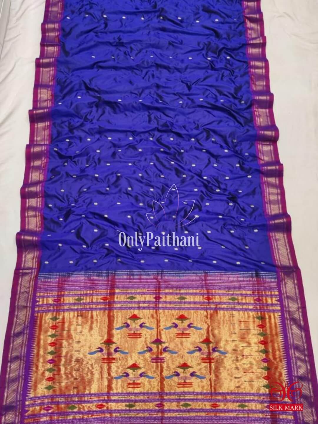 Blue silk paithani saree with pinkish border