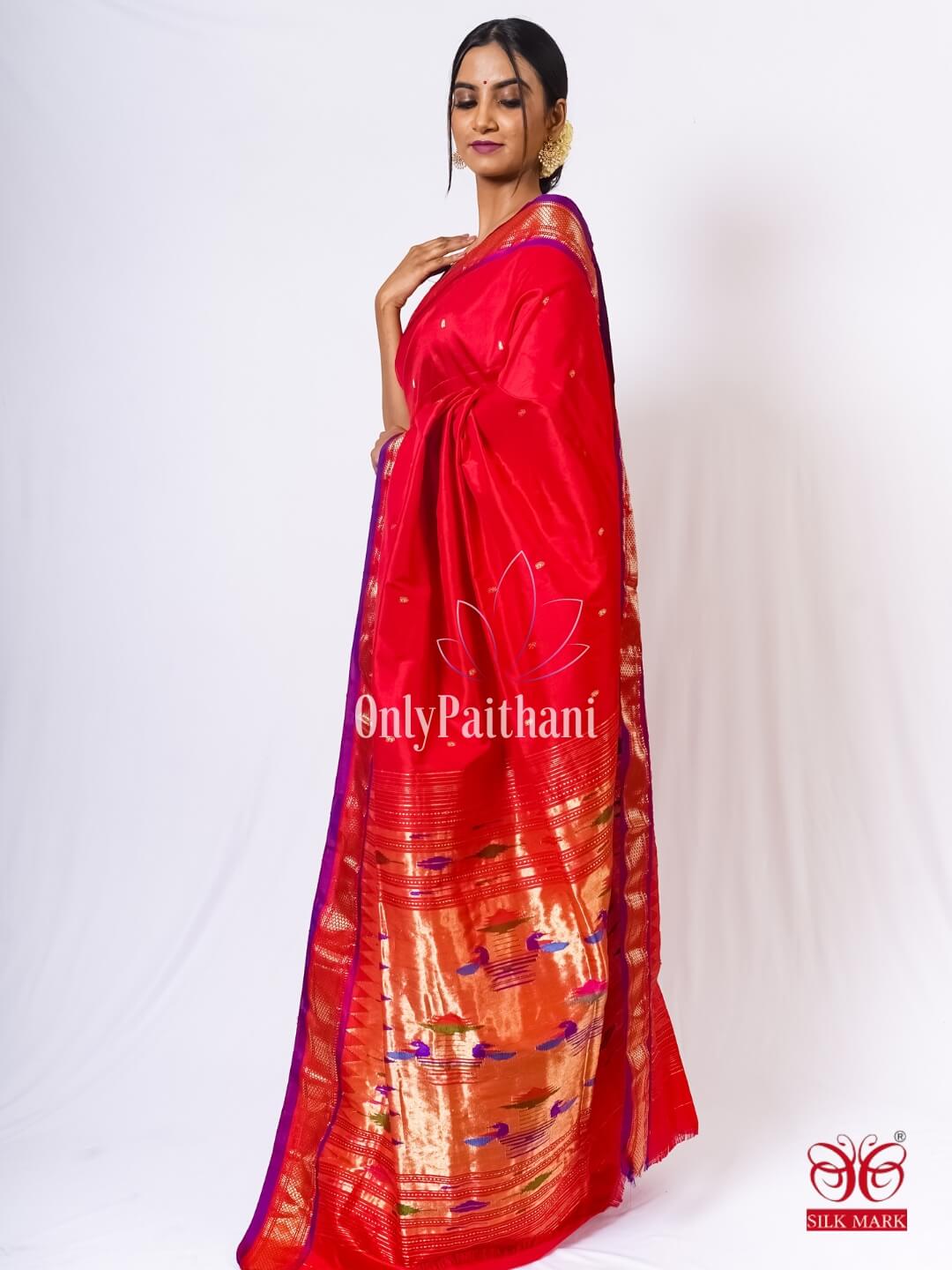 Red paithani silk saree with purple border