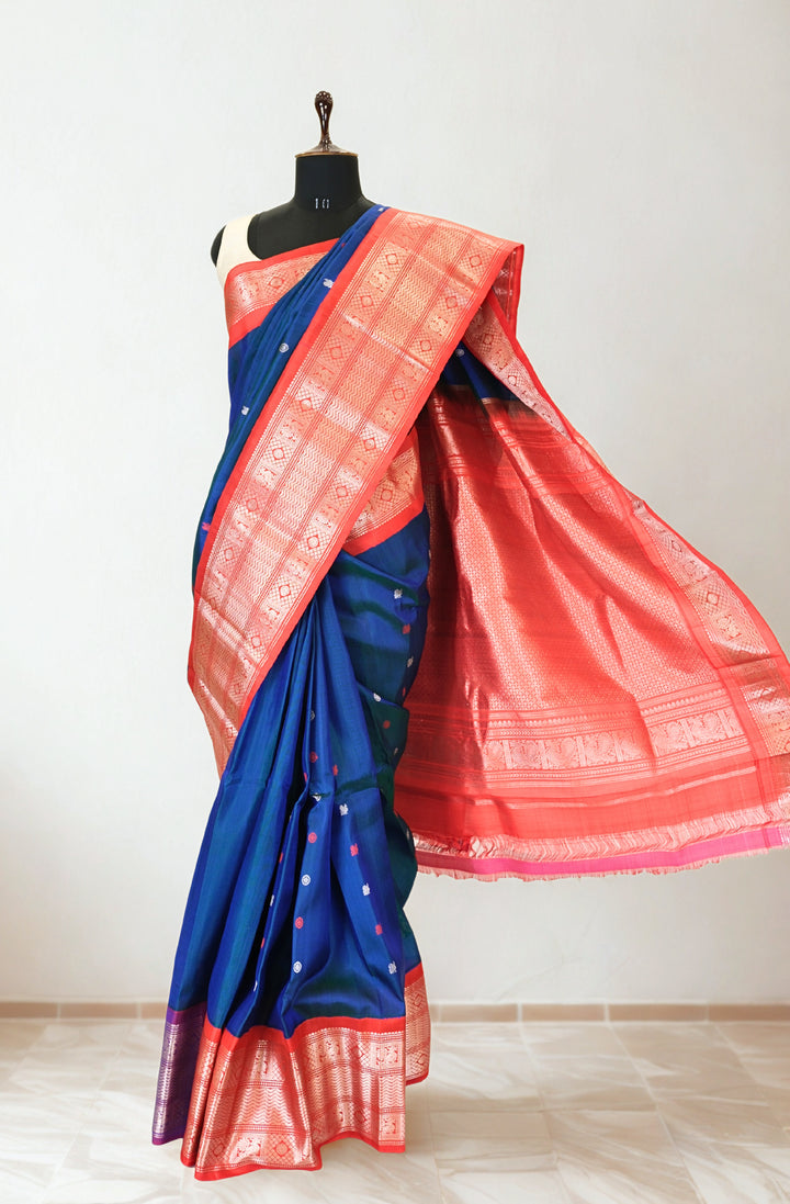 Navy blue gadwal silk saree with red contrast rich border