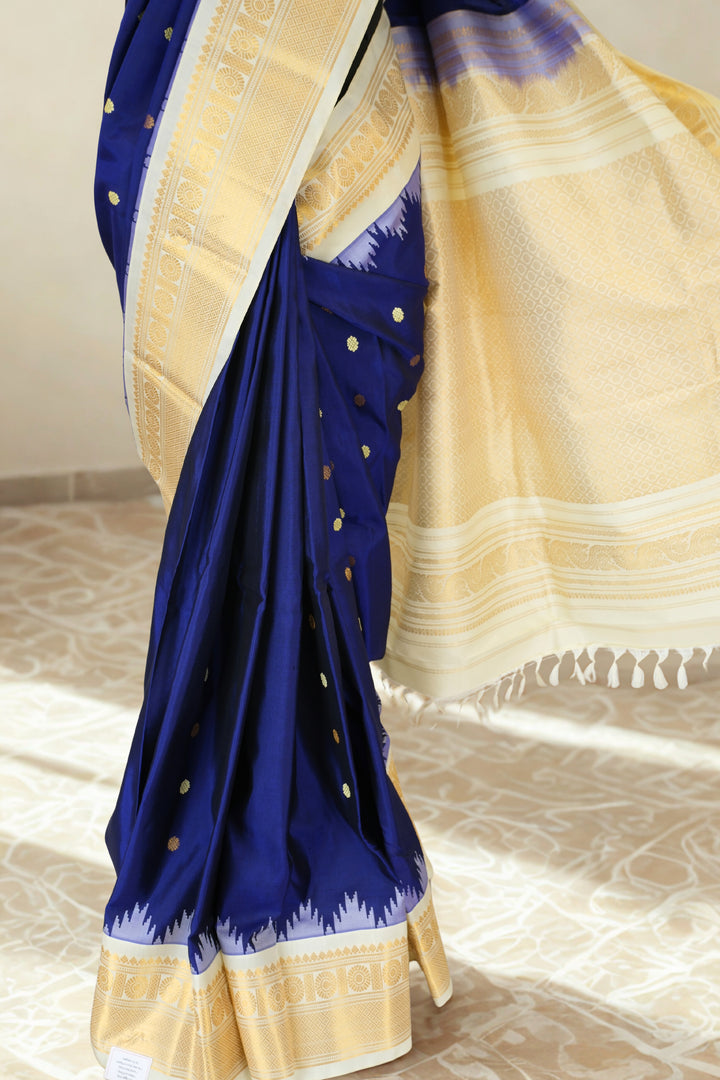 Navy blue silk gadwal saree with beige border