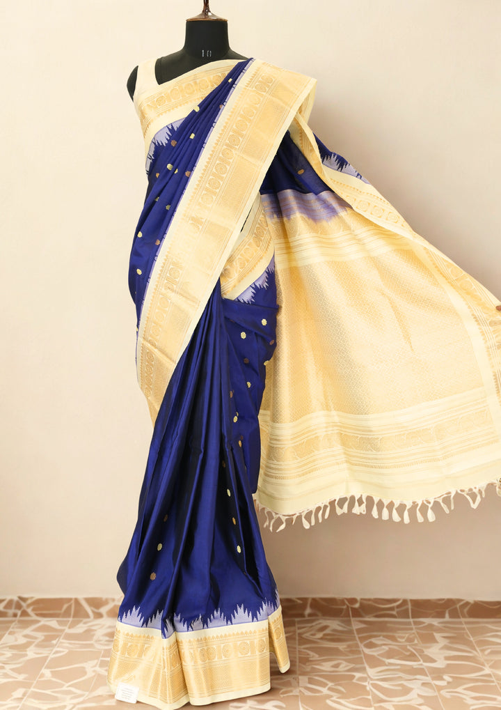 Navy blue silk gadwal saree with beige border