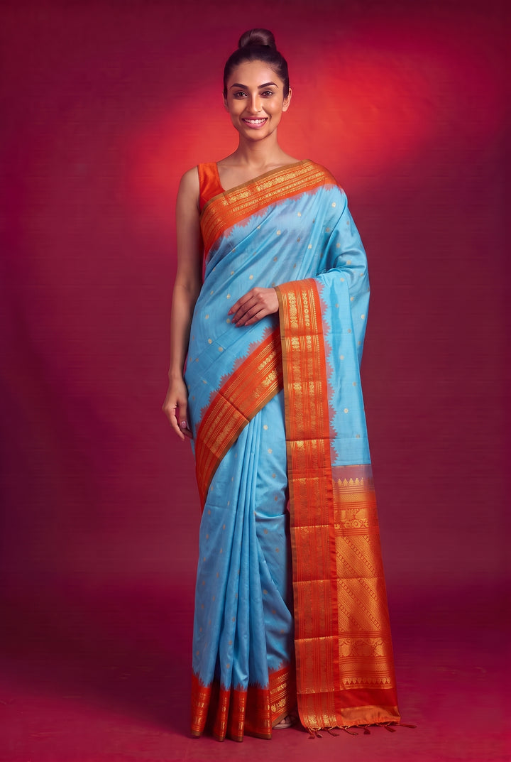 Turquoise silk gadwal saree with red temple border