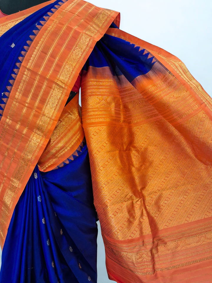 Blue silk gadwal saree with temple border