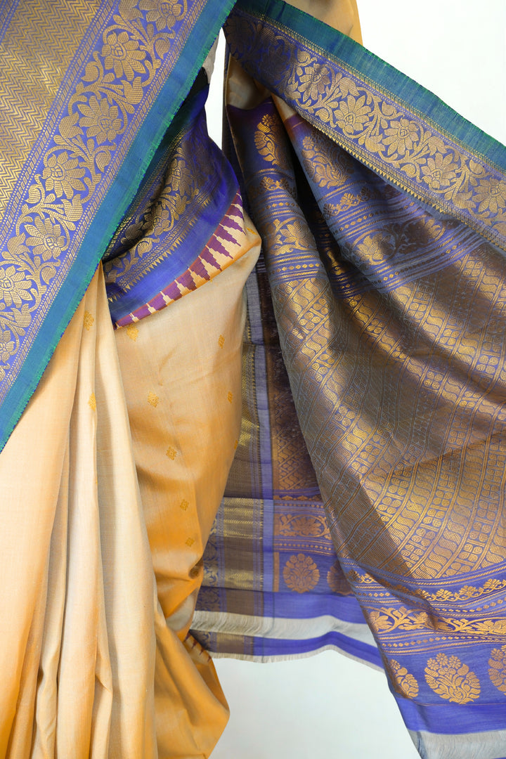Cream gadwal silk saree with temple border