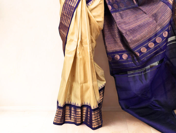 Beige gadwal silk saree with rich border