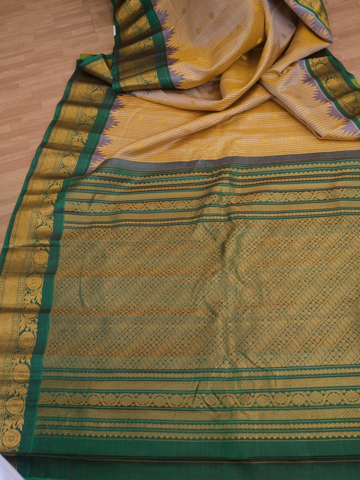 Beige checks silk gadwal saree with temple border