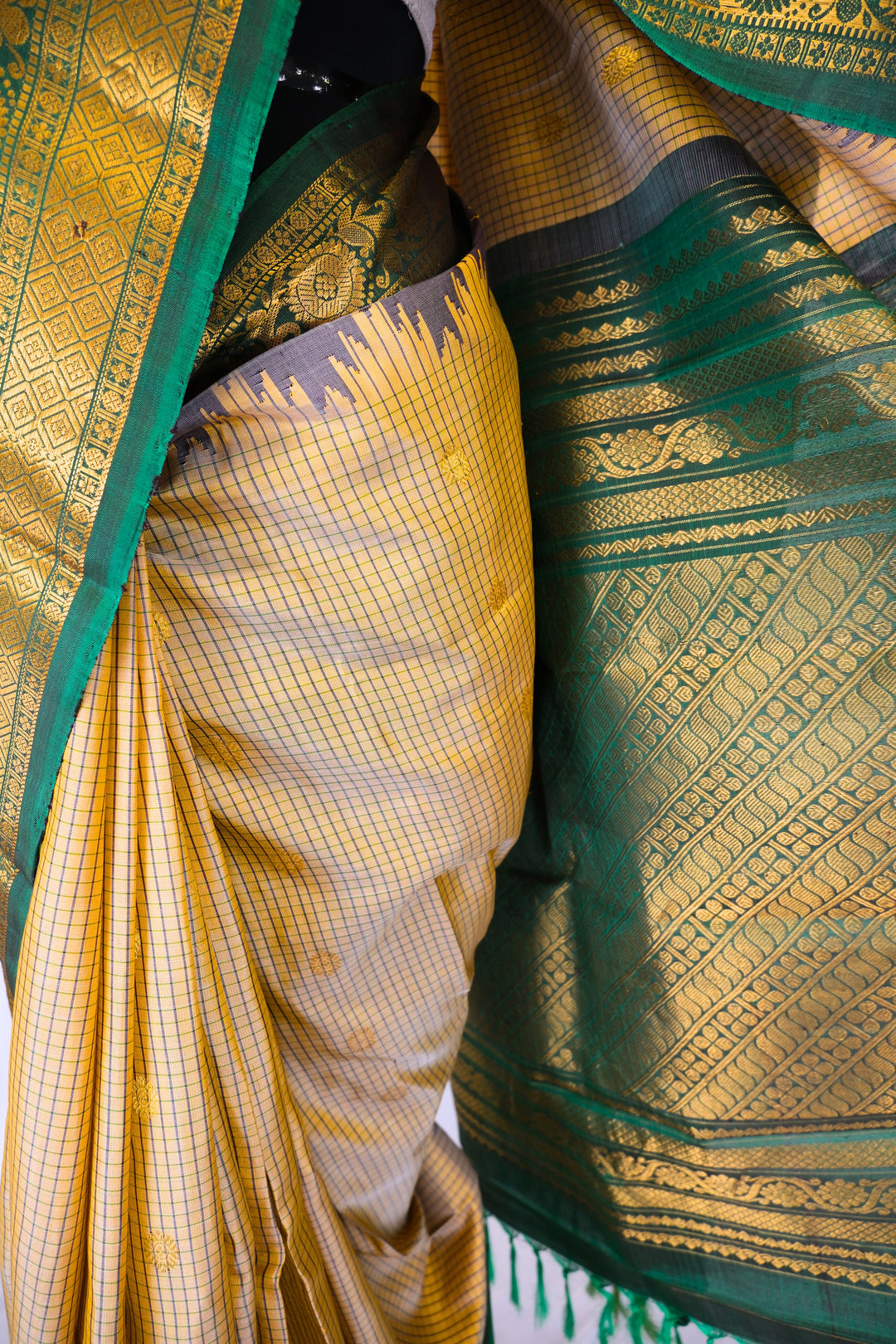 Beige checks silk gadwal saree with temple border
