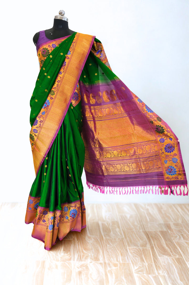 Bottle green silk gadwal saree with gold zari border