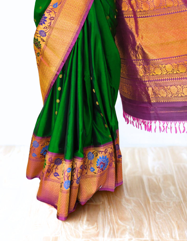 Bottle green silk gadwal saree with gold zari border