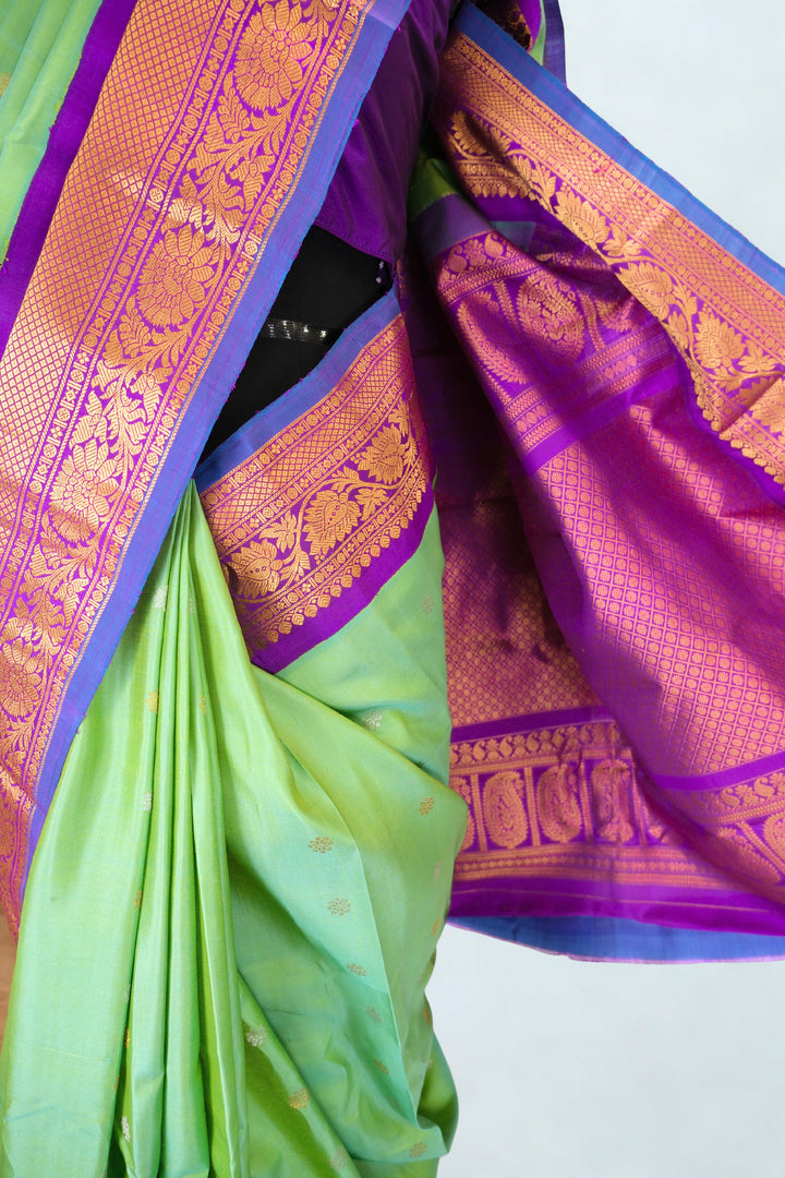 Sea green silk gadwal saree with rich border
