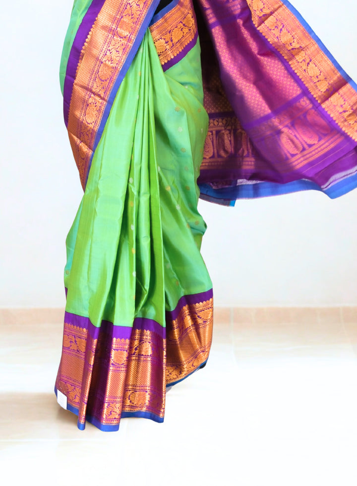 Sea green silk gadwal saree with rich border