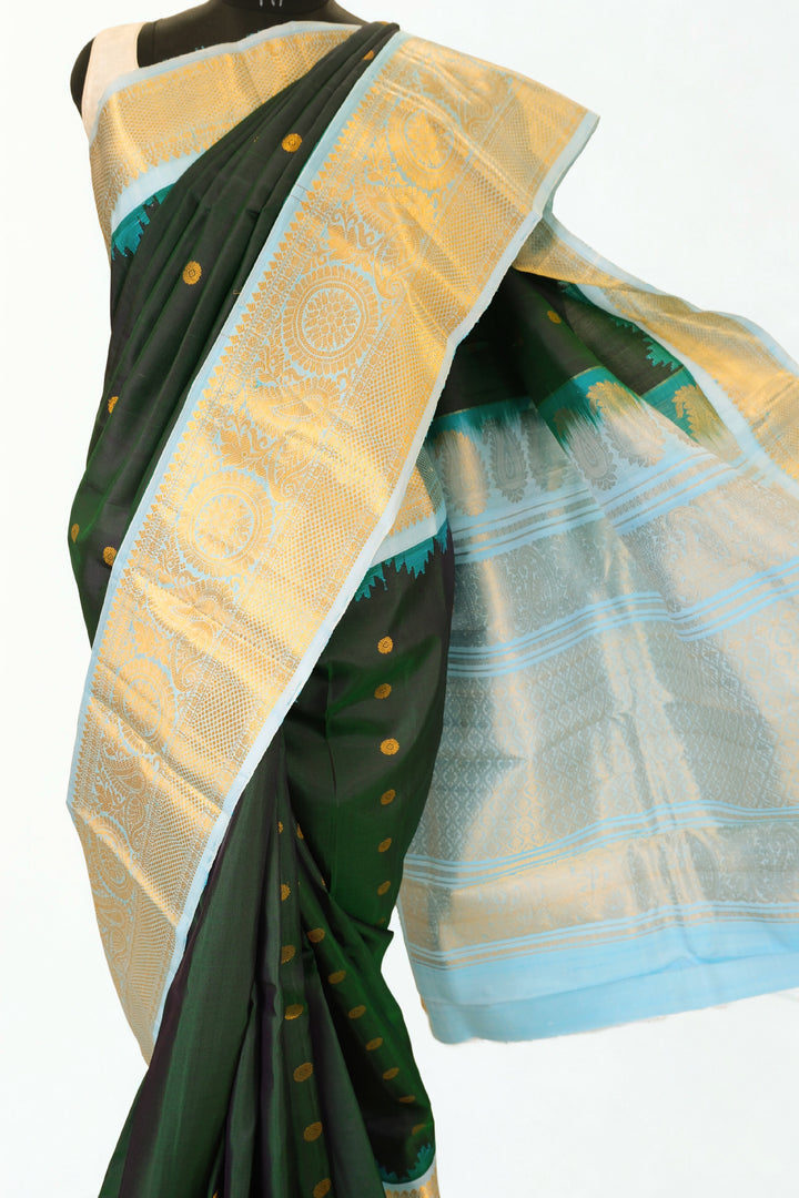 Bottle green silk gadwal saree with rich border
