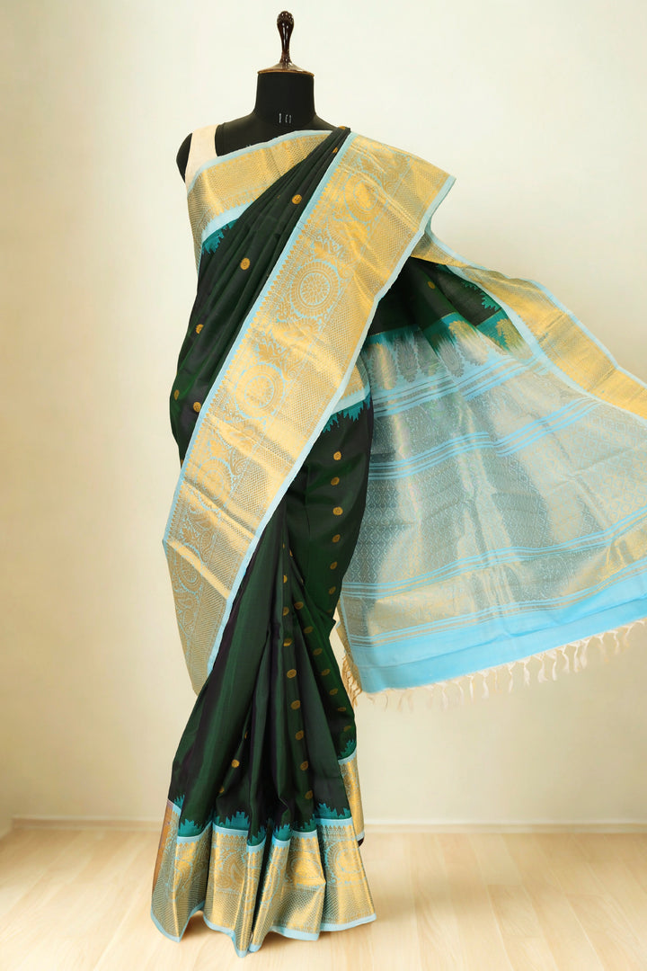 Bottle green silk gadwal saree with rich border