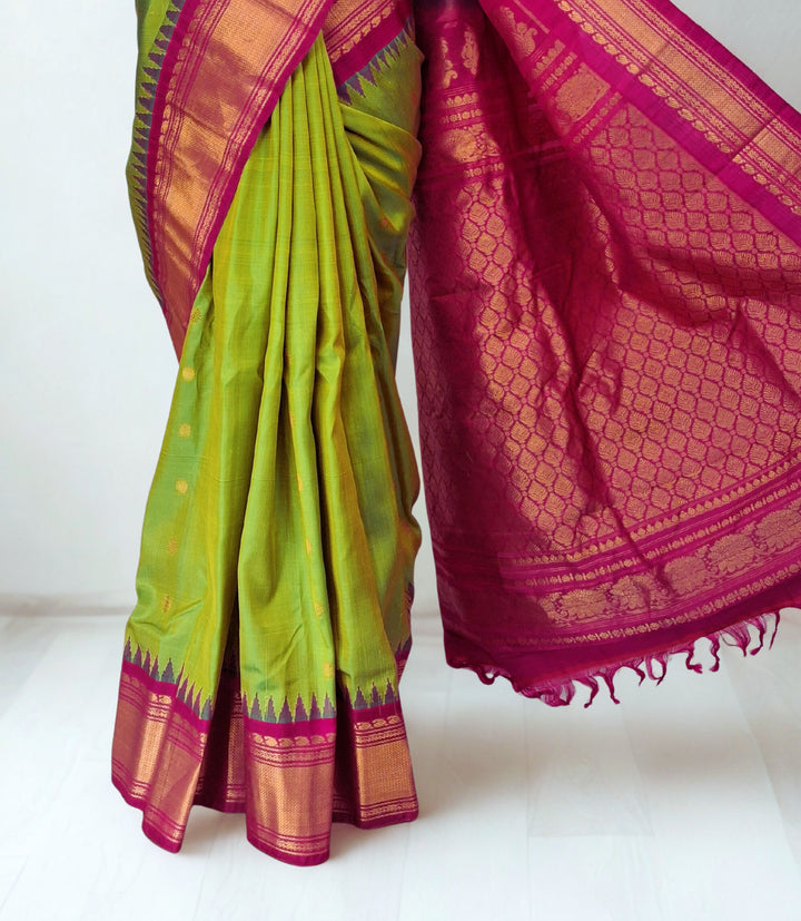 Parrot green gadwal silk saree with temple border