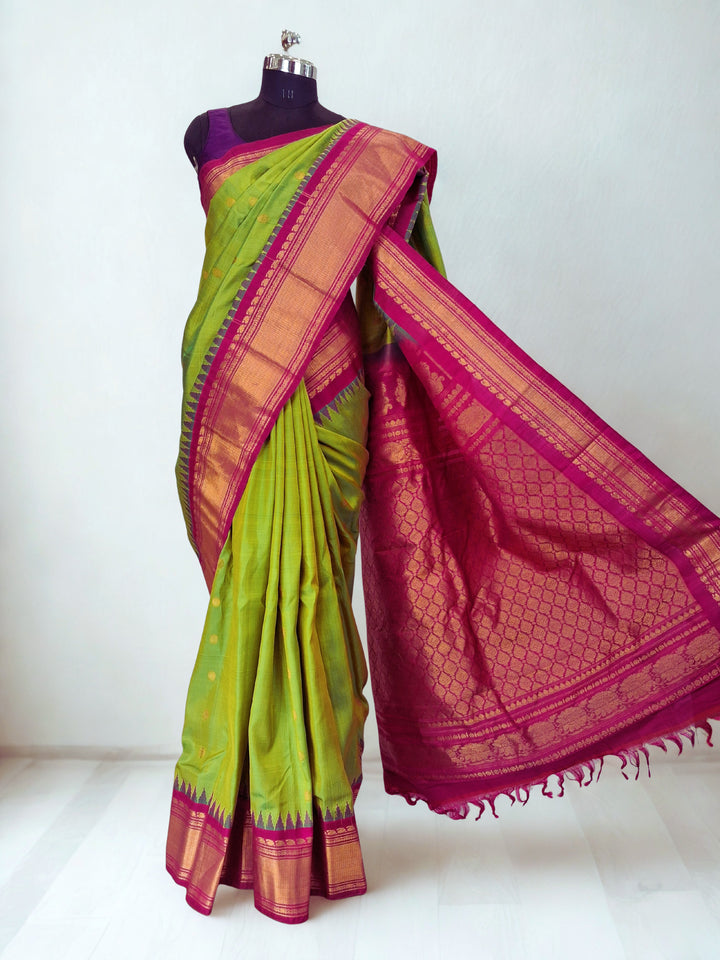 Parrot green gadwal silk saree with temple border