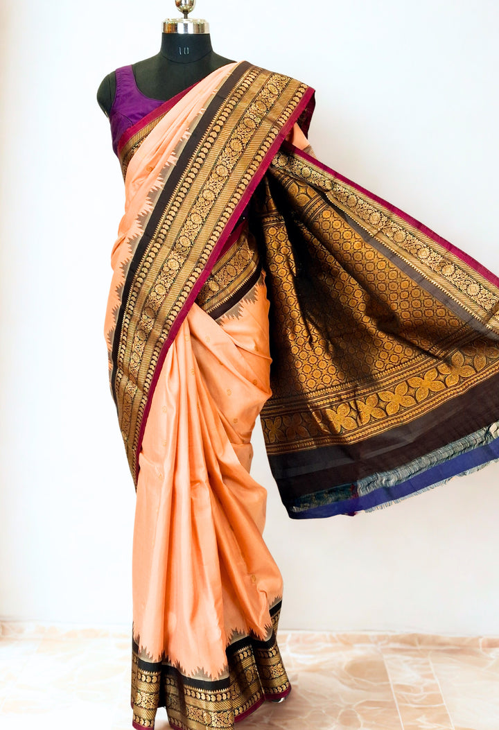 Peach silk gadwal saree with temple border