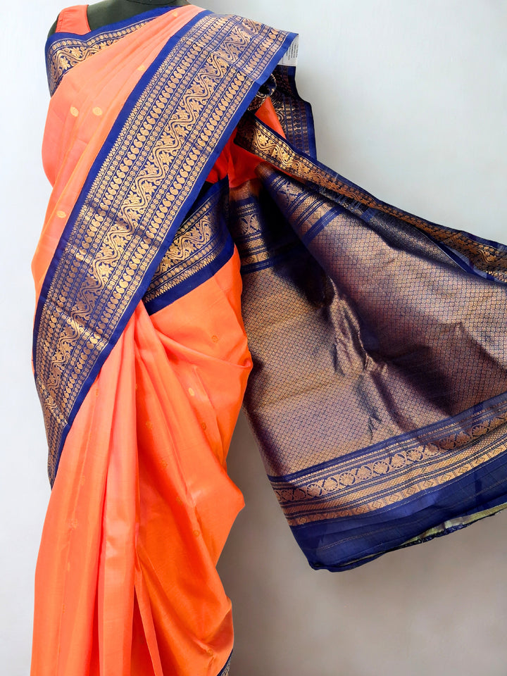 Peach pink silk gadwal saree