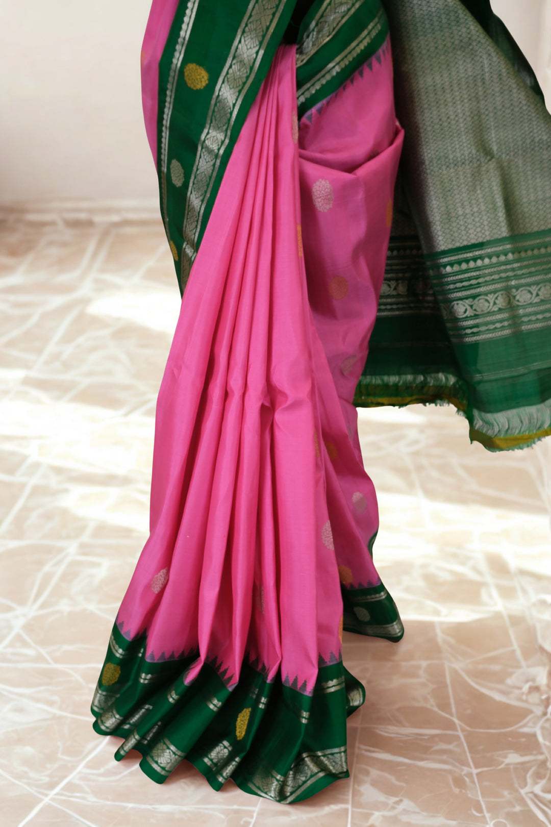 Pink gadwal silk saree with green temple border