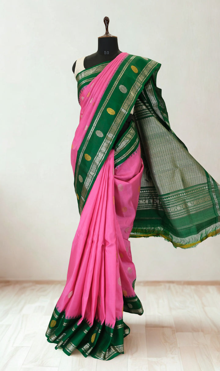 Pink gadwal silk saree with green temple border