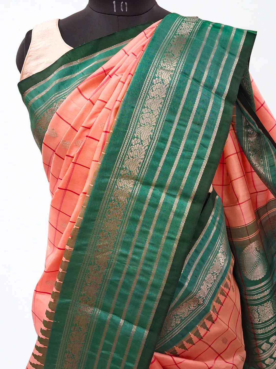 Peach silk gadwal silk saree with temple border