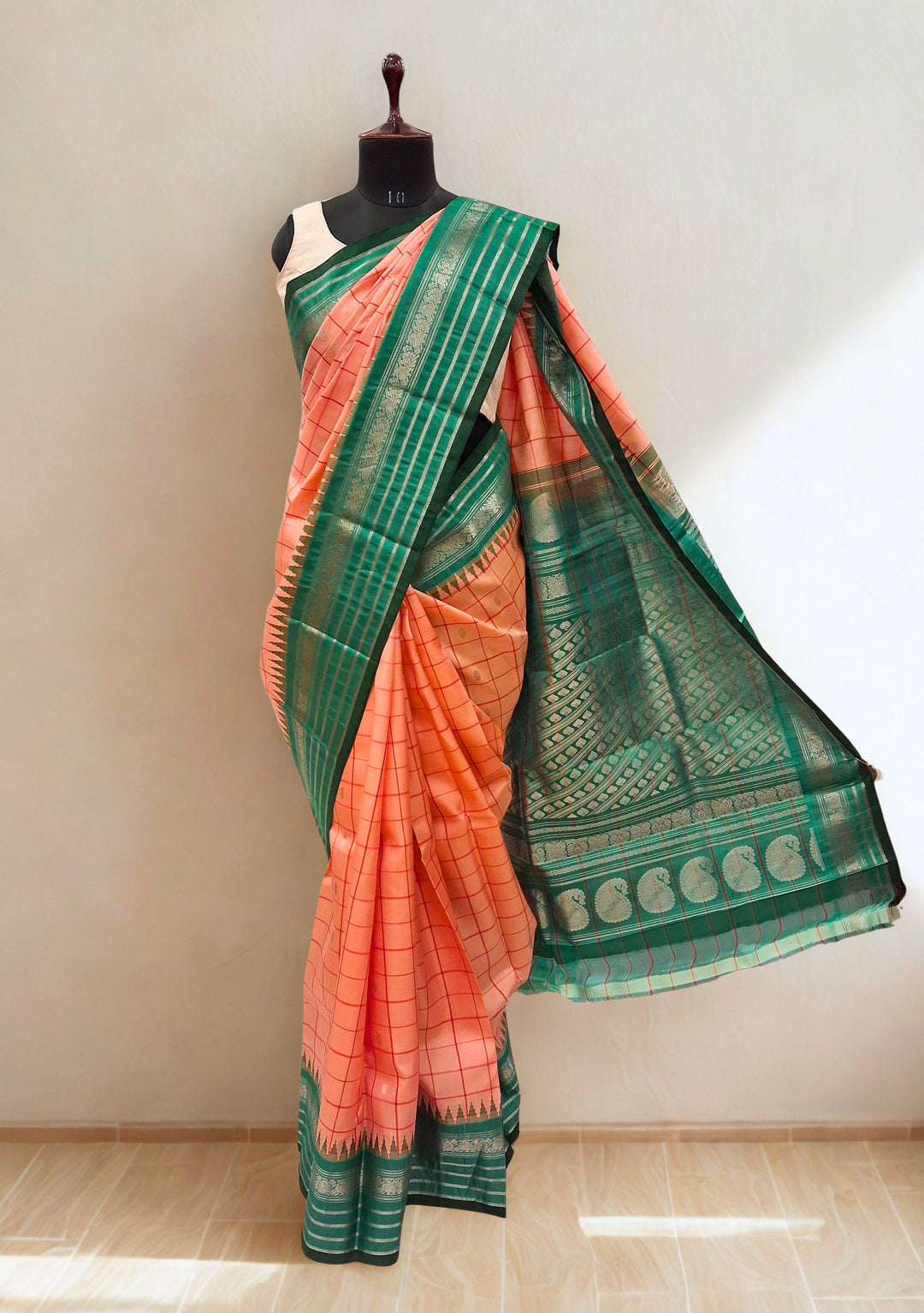 Peach silk gadwal silk saree with temple border