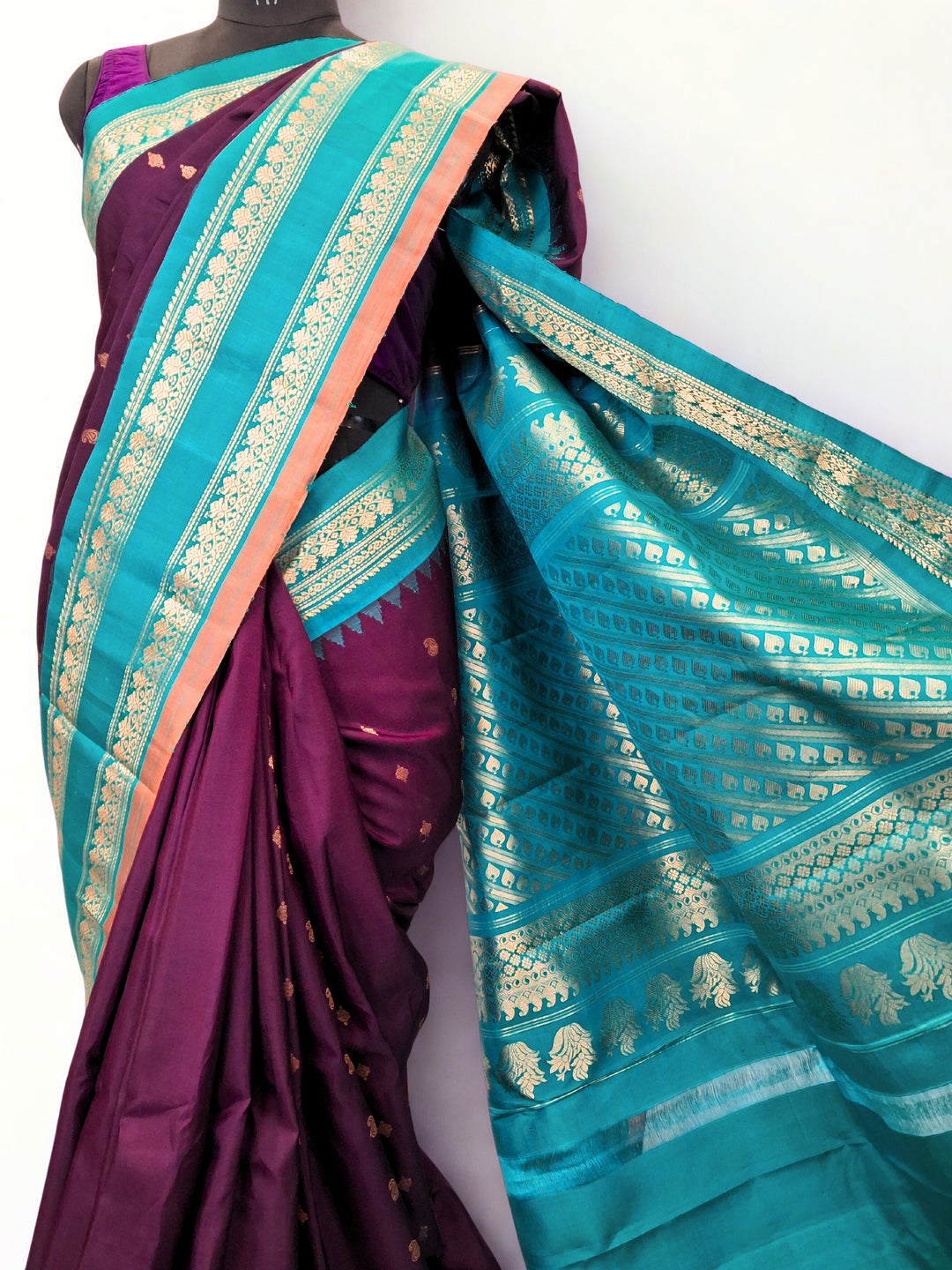 Deep wine gadwal silk saree with temple border