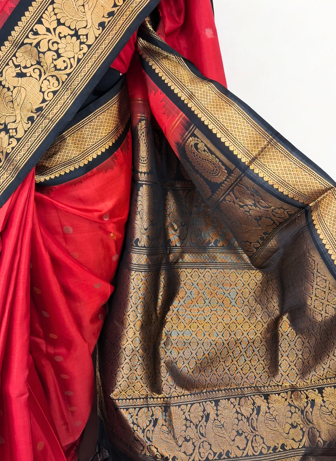 Red silk gadwal saree with rich border