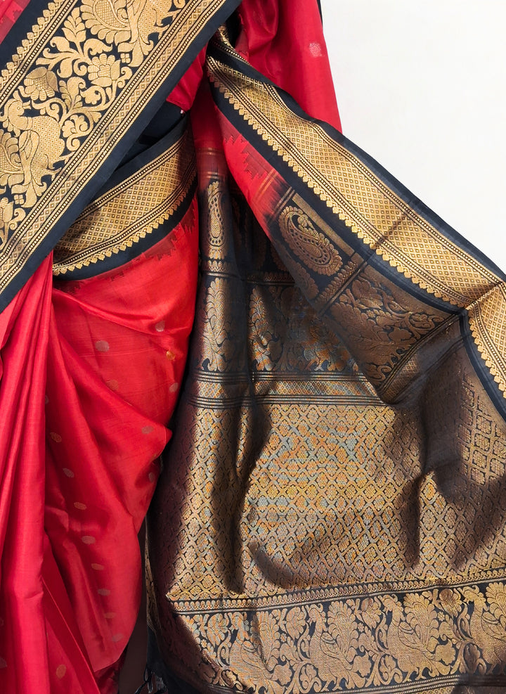 Red silk gadwal saree with rich border