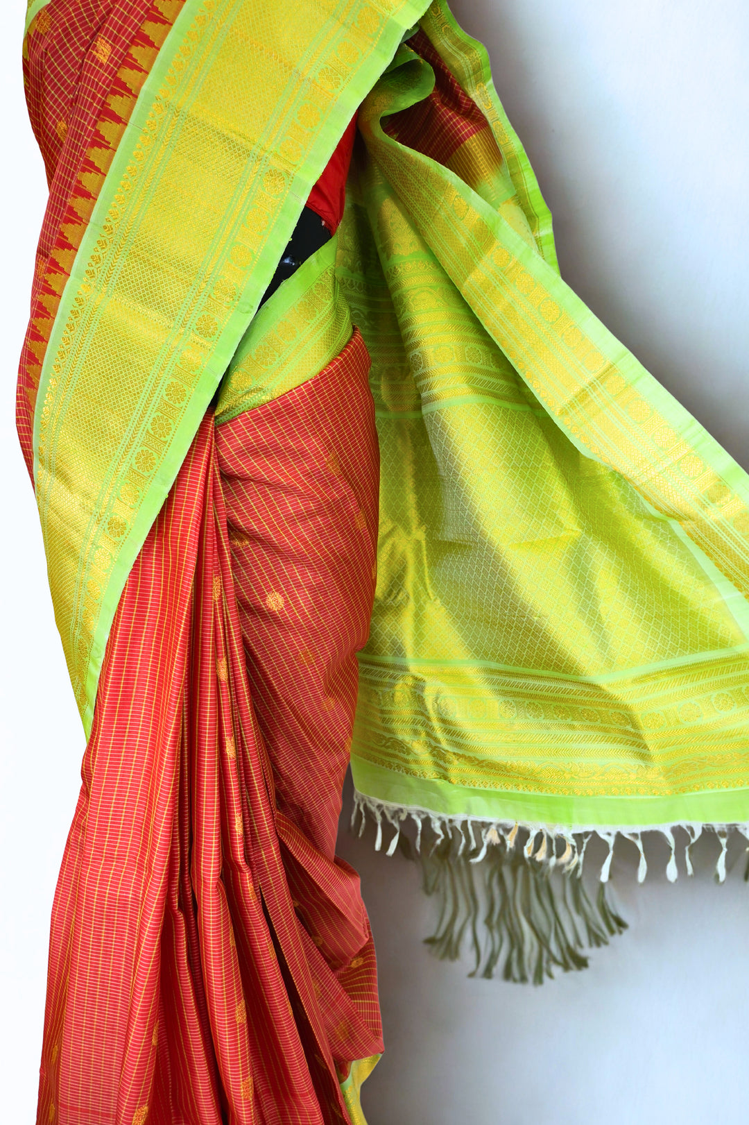 Rust checks gadwal silk saree with temple border