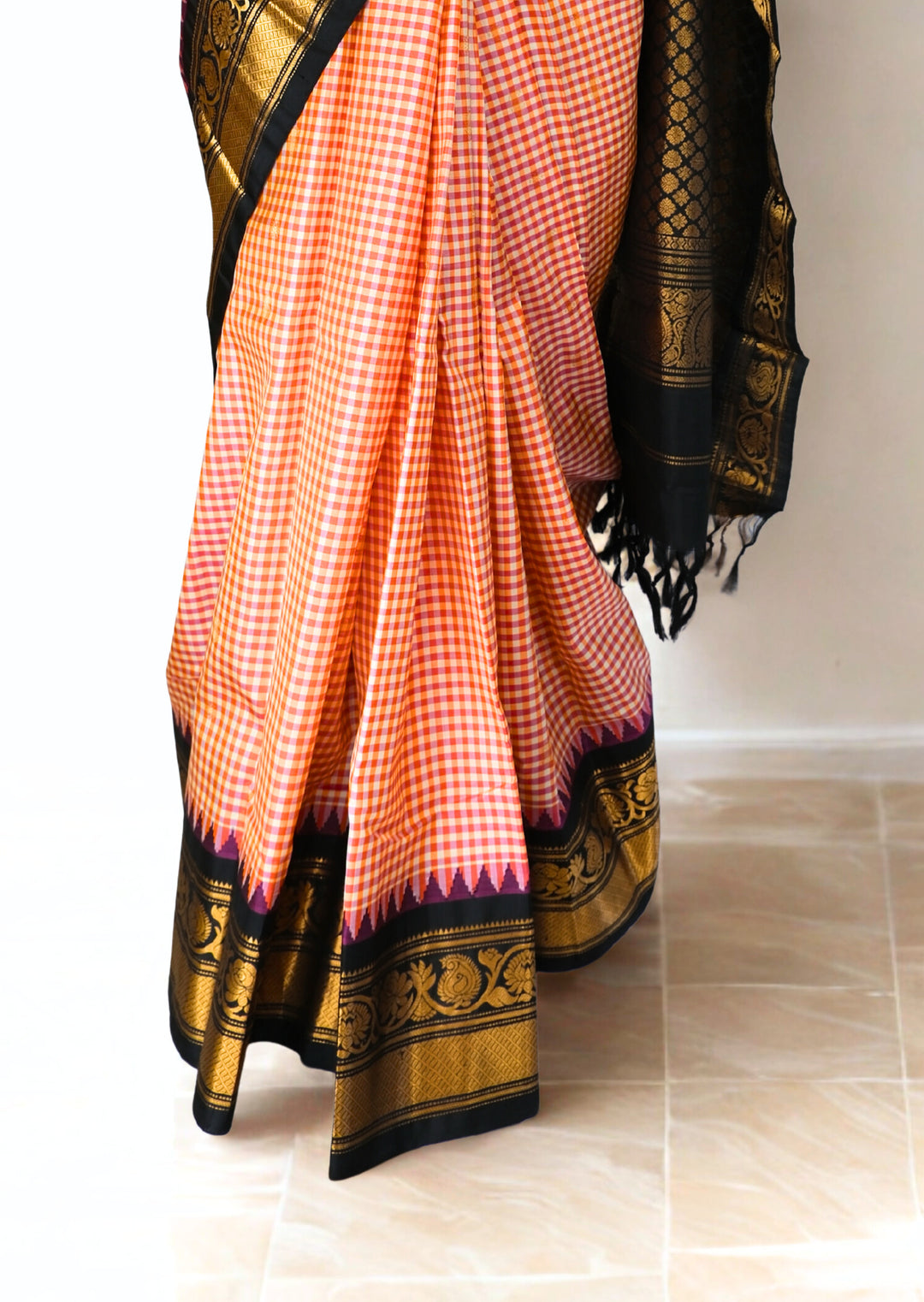 Red and peach checks silk gadwal saree with temple border