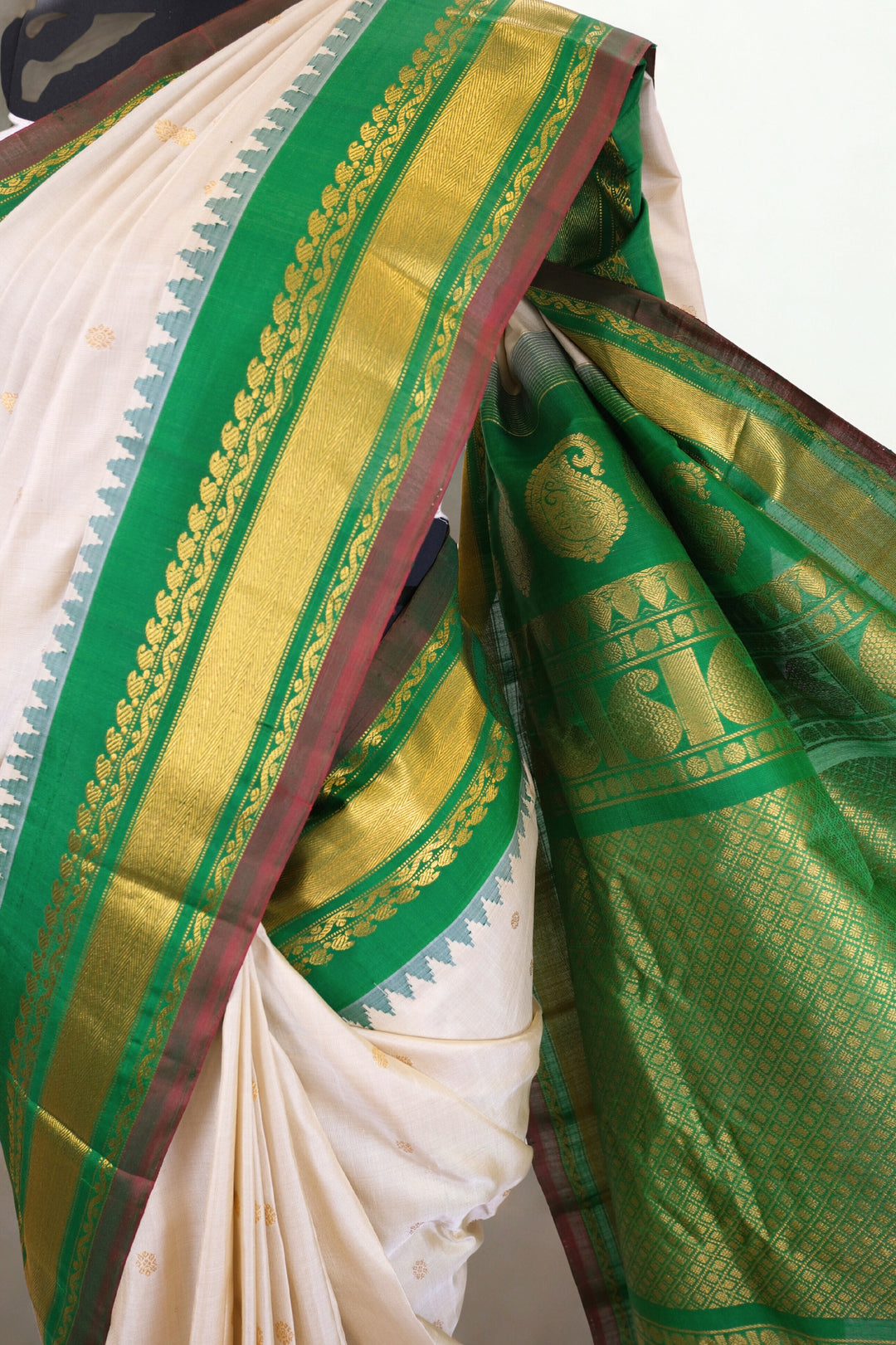 Offwhite silk gadwal saree with temple border
