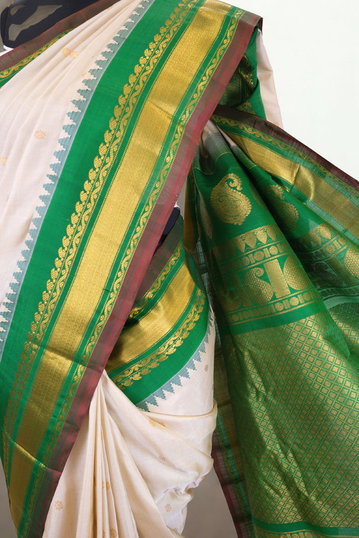 Offwhite silk gadwal saree with temple border