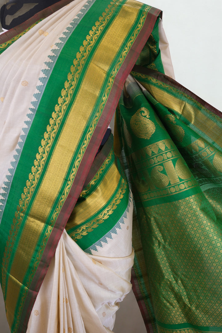 Offwhite silk gadwal saree with temple border
