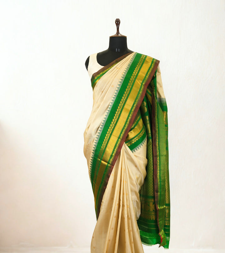 Offwhite silk gadwal saree with temple border
