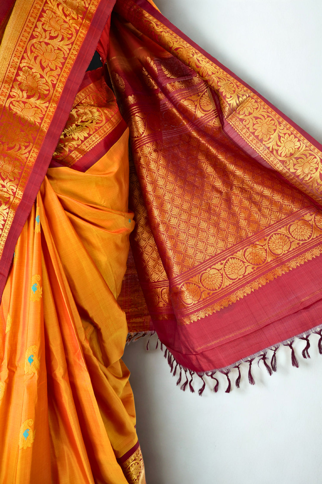 Mustard silk gadwal saree with rich border