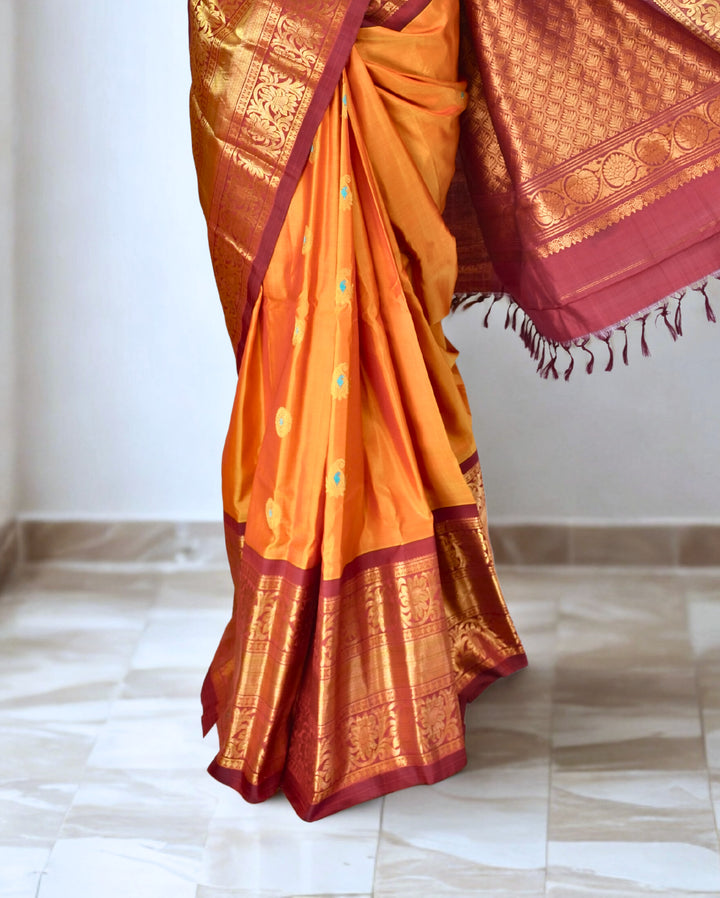 Mustard silk gadwal saree with rich border