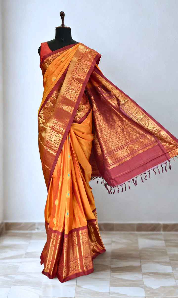 Mustard silk gadwal saree with rich border