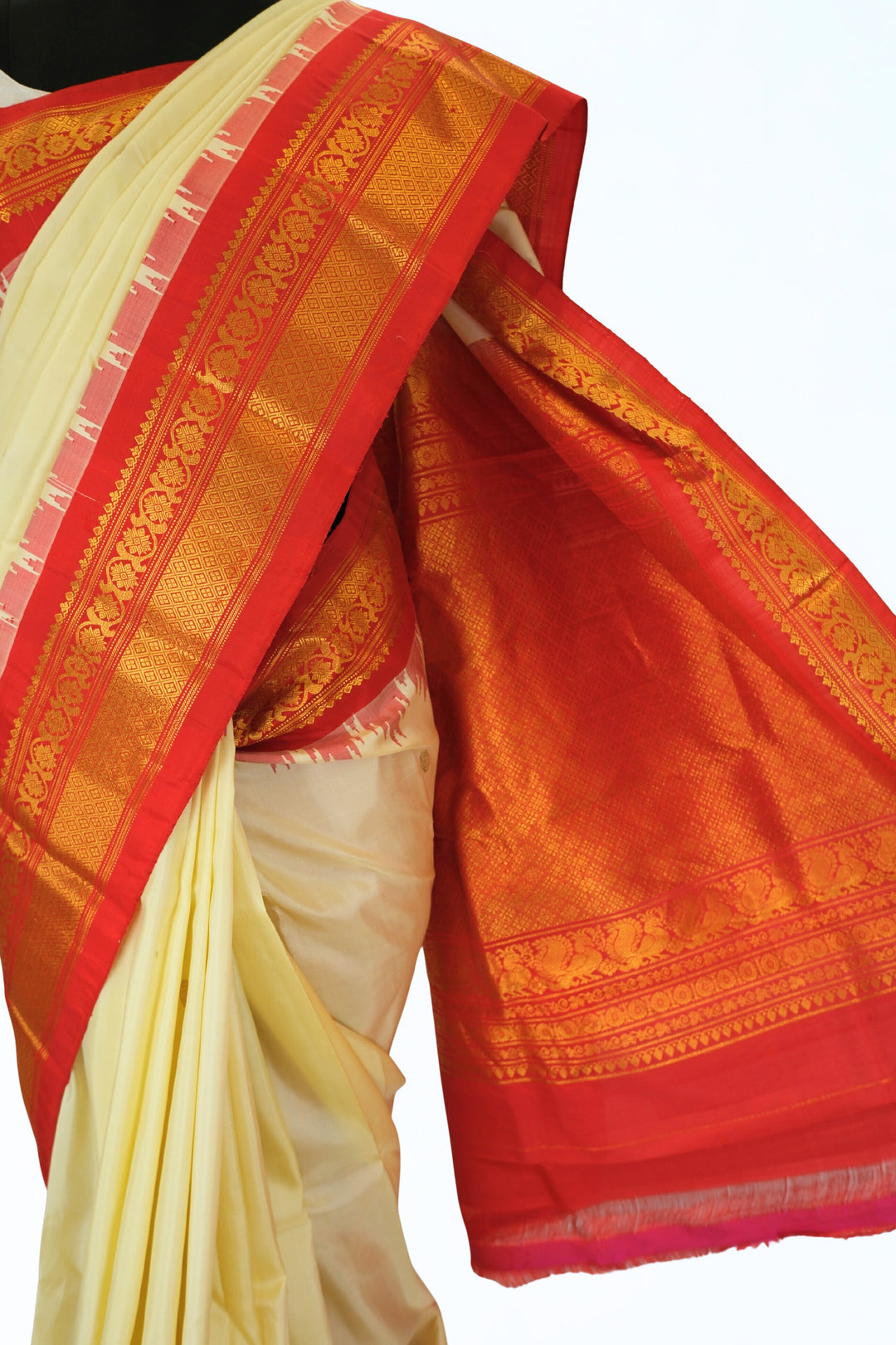 Butterscotch yellow silk gadwal saree with temple border