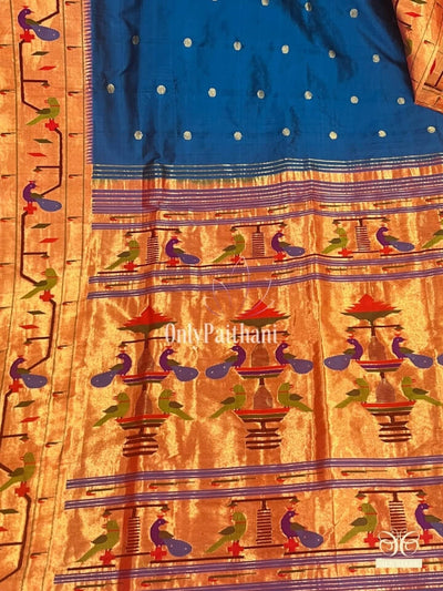 Teal blue silk paithani saree with parrot and peacock border
