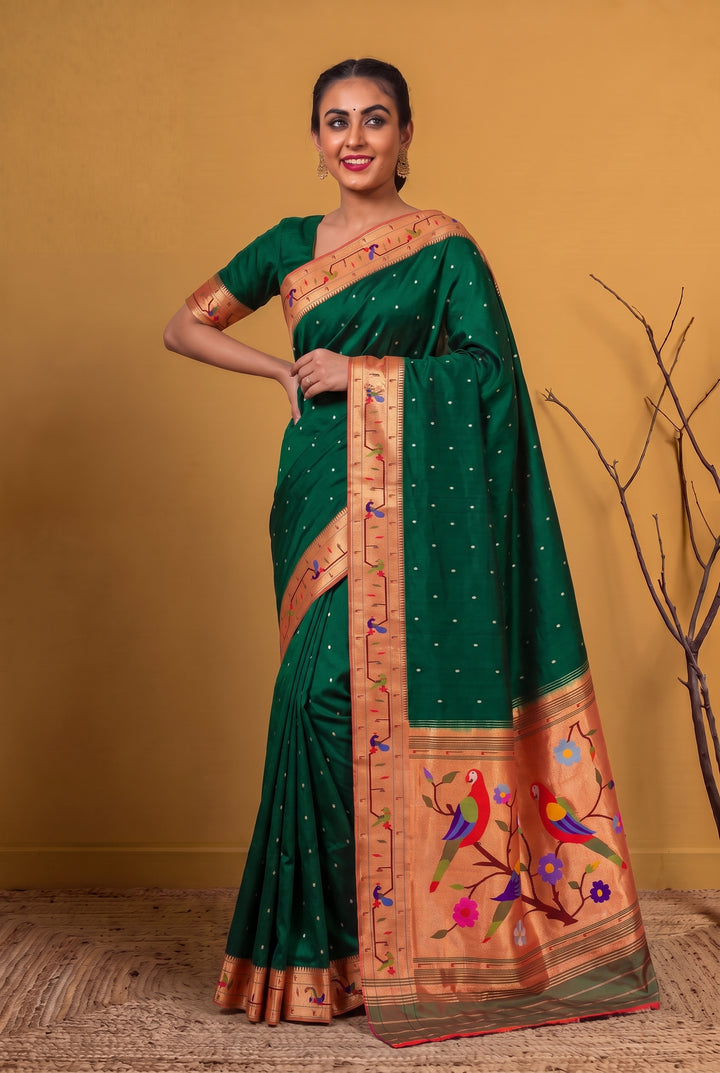 Bottle green parrot and peacock border silk paithani saree