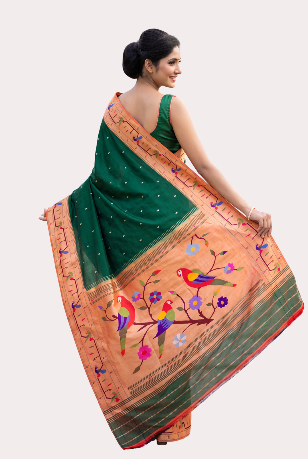 Bottle green parrot and peacock border silk paithani saree