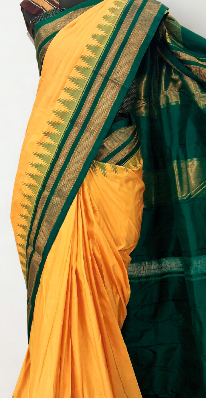 Yellow silk ilkal saree with green border