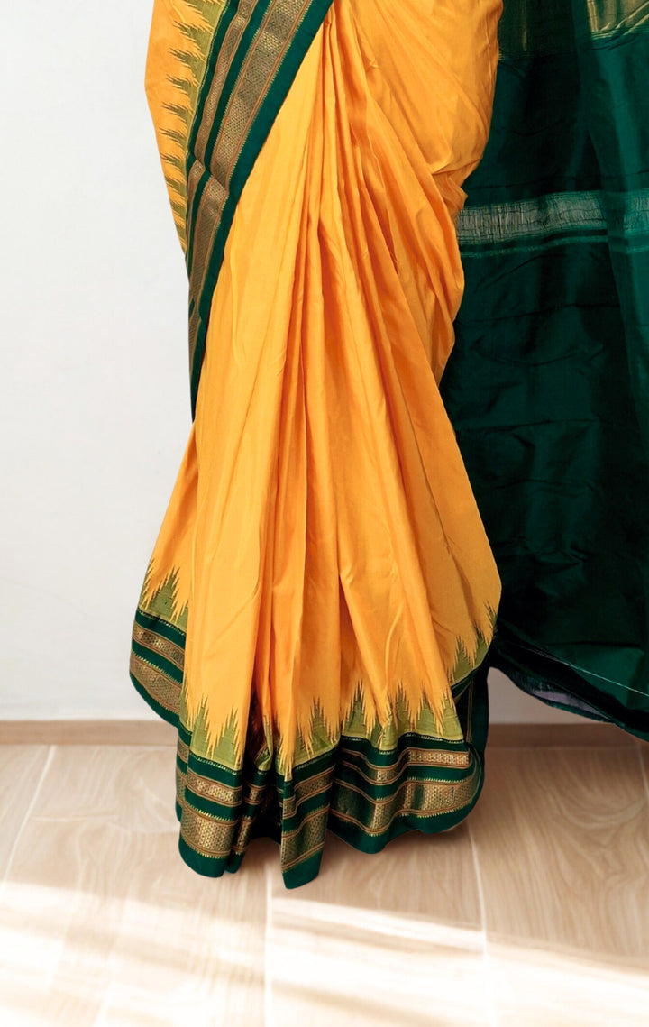 Yellow silk ilkal saree with green border