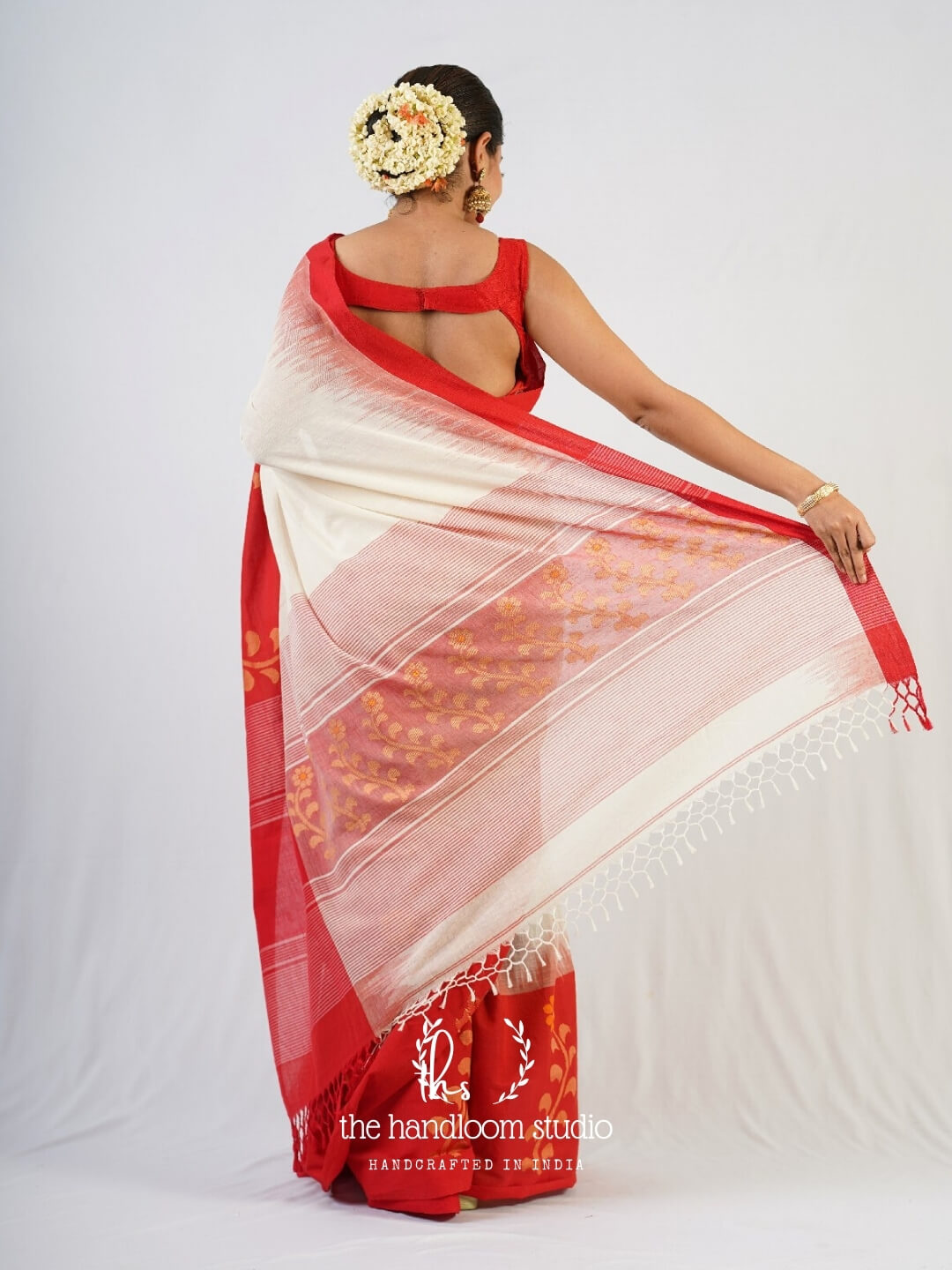 Offwhite cotton jamdani saree with rich red borders