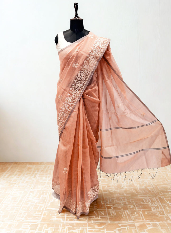 Muted peach kota doria saree