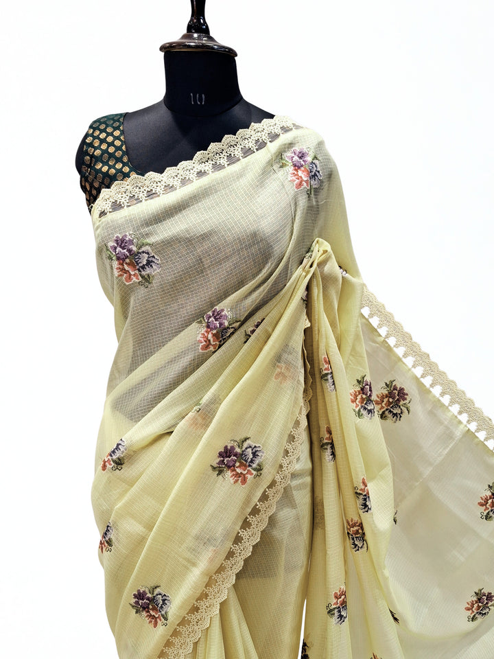 Soft pastel yellow kota doria saree