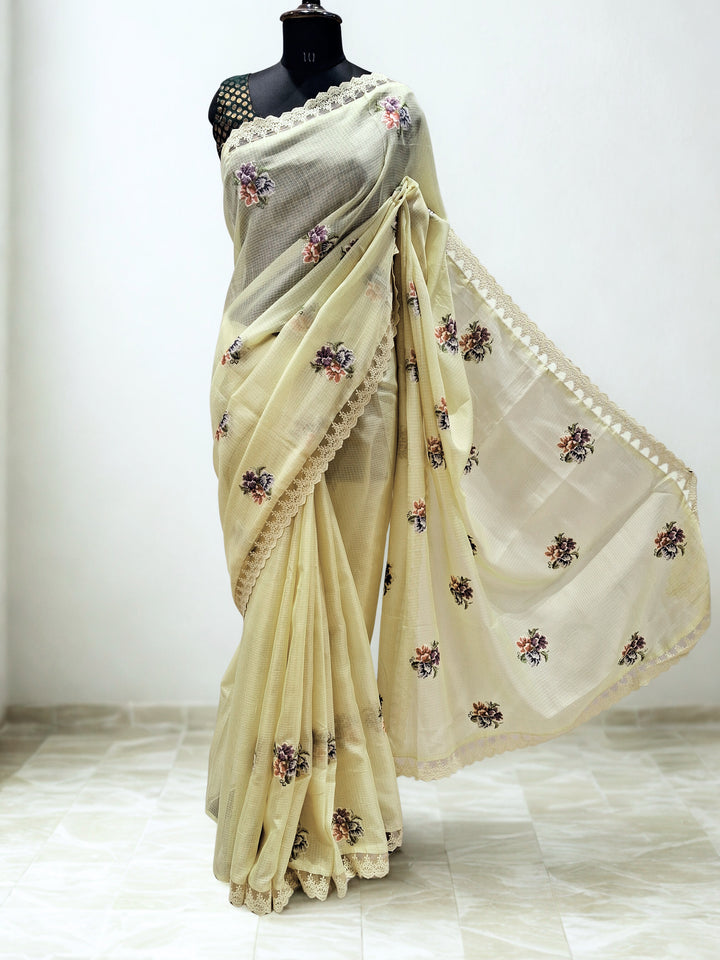 Soft pastel yellow kota doria saree